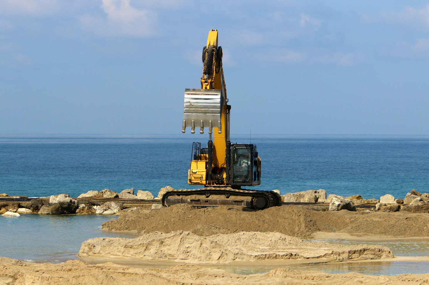 Senegal, the construction of a dyke against rising water levels due to global warming. Shutterstock