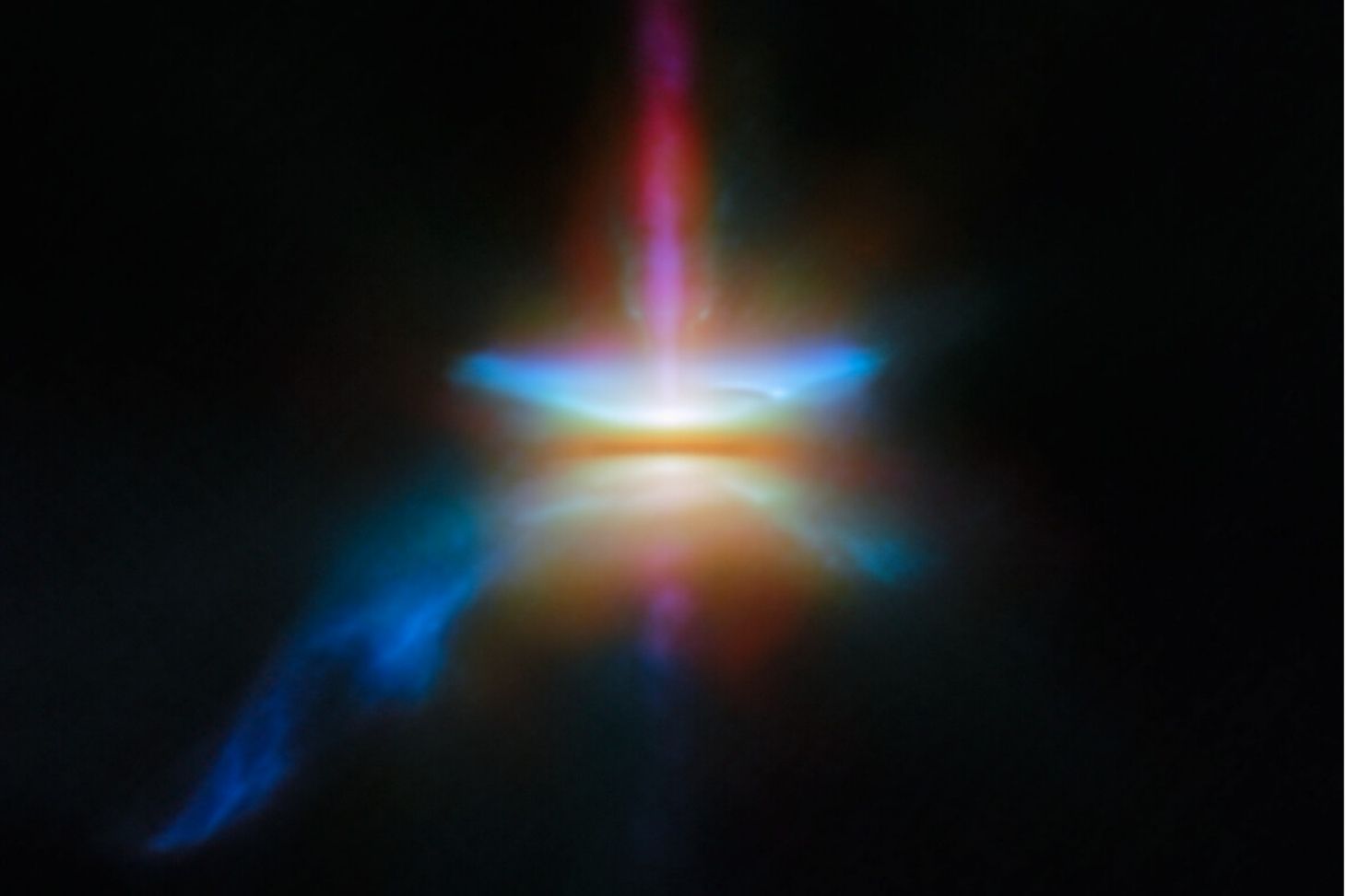 Image rapprochée du disque protoplanétaire HH 30 autour d'une étoile nouvellement formée. De nombreuses longueurs d'onde différentes sont combinées et représentées par des couleurs distinctes et variées. ©ESA/Webb, NASA & CSA, Tazaki et al.